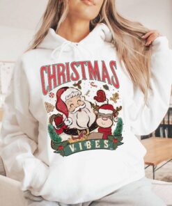 vintage christmas sweatshirt for women featuring retro santa design ideal for winter wear and holiday gatherings qjdij