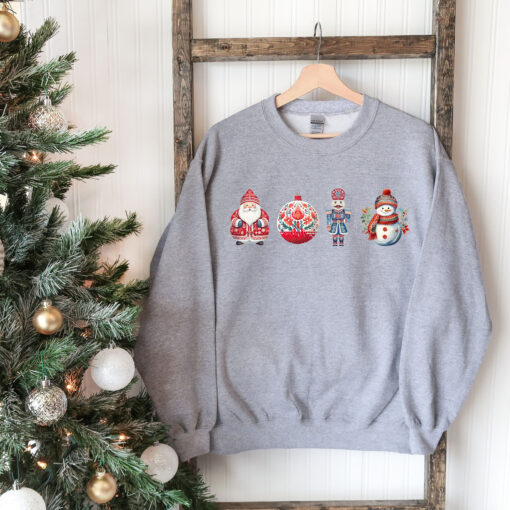 vintage christmas sweatshirt for women featuring santa and snowman designs comfortable holiday apparel for seasonal celebrations cngvk scaled