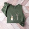 vintage christmas sweatshirt for women featuring snowman design comfortable crewneck style perfect for holiday celebrations oja4e