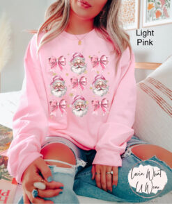 vintage christmas sweatshirt for women pink santa design with bow oversized trendy holiday top for festive celebrations mj4mo