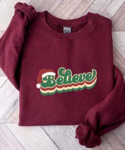 vintage christmas sweatshirt for women with believe and merry bright design comfortable crewneck style for holiday wear pgyli scaled