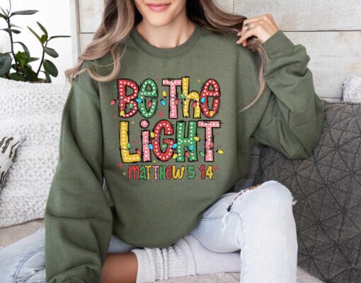 vintage christmas sweatshirt for women with bible verse design and religious theme