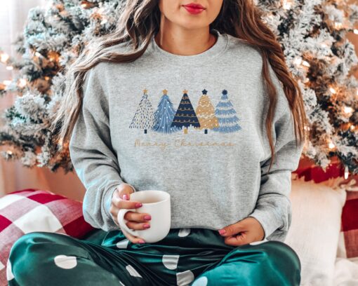 vintage christmas sweatshirt for women with blue christmas trees design comfortable crewneck for holiday outfits and work wear v5ggl