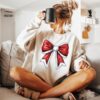 vintage christmas sweatshirt for women with bow design long sleeve shirt for christmas 2024 celebrations atsz5 scaled