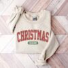 vintage christmas sweatshirt for women with retro varsity style for holiday celebrations and festive gatherings tibov