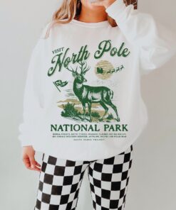 vintage christmas sweatshirt north pole crewneck retro santa claus design national park inspired reindeer print for her cis5y