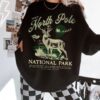 vintage christmas sweatshirt north pole crewneck retro santa claus design national park inspired reindeer print for her dtanl