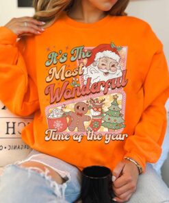 vintage christmas sweatshirt retro santa claus design featuring hot cocoa and gingerbread elements for holiday comfort itnr5