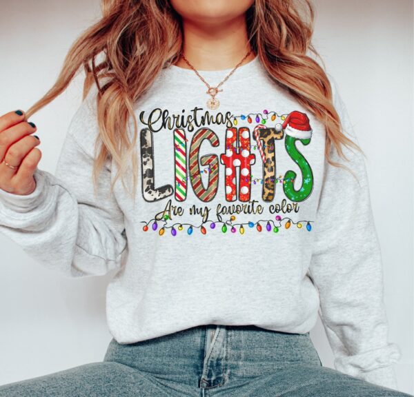 vintage christmas sweatshirt with animal print and merry lights design for holiday celebrations