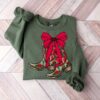 vintage christmas sweatshirt with boot scootin design for western style cowgirl apparel tr42i