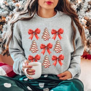 vintage christmas sweatshirt with bow design and christmas tree cake graphic for trendy holiday apparel jqriu