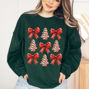 vintage christmas sweatshirt with bow design and christmas tree cake graphic for trendy holiday apparel unqvt