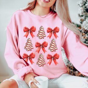 vintage christmas sweatshirt with bow design and christmas tree cake graphic for trendy holiday apparel zvjuc