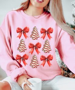 vintage christmas sweatshirt with bow design and christmas tree cake graphic for trendy holiday apparel zvjuc scaled