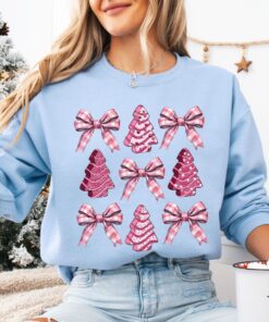 vintage christmas sweatshirt with bow design and pink christmas tree cake print trendy girly style for holiday celebrations fj1cb scaled