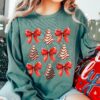 vintage christmas sweatshirt with bow design featuring christmas tree cake in comfort colors for a girly holiday look wqcv8 scaled