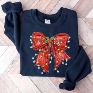 vintage christmas sweatshirt with bow design for retro holiday style and festive vibes cgueg scaled