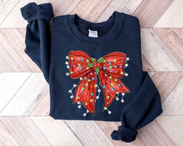 vintage christmas sweatshirt with bow design for retro holiday style and festive vibes cgueg scaled