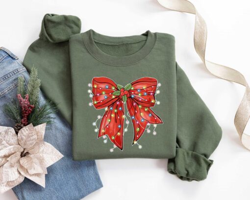 vintage christmas sweatshirt with bow design for retro holiday style and festive vibes n5hhf