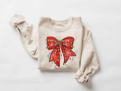 vintage christmas sweatshirt with bow design for retro holiday style and festive vibes ph8mv scaled