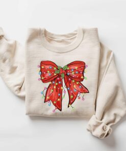 vintage christmas sweatshirt with bow design for retro holiday style and festive vibes ph8mv scaled