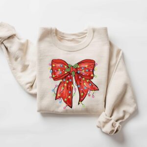 vintage christmas sweatshirt with bow design for retro holiday style and festive vibes ph8mv scaled