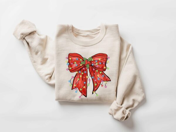 vintage christmas sweatshirt with bow design for retro holiday style and festive vibes ph8mv scaled