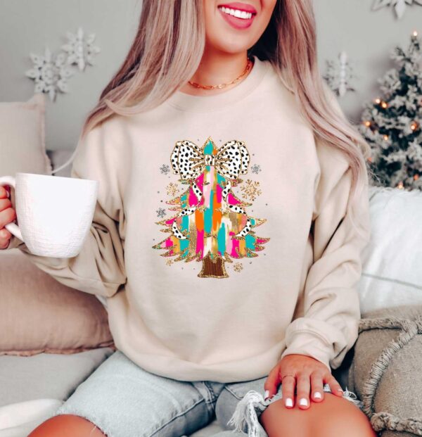 vintage christmas sweatshirt with bow tree design and matching t shirt for holiday celebrations and santa coquette style