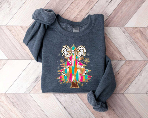 vintage christmas sweatshirt with bow tree design and matching t shirt for holiday celebrations and santa coquette style resgq