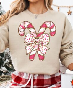 vintage christmas sweatshirt with candy cane design for christmas squad crewneck and pink christmas style 8iotw scaled