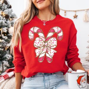 vintage christmas sweatshirt with candy cane design for christmas squad crewneck and pink christmas style idwkf