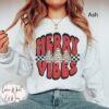 vintage christmas sweatshirt with checkered tree design and merry vibes for oversized holiday comfort and style 0gpgw
