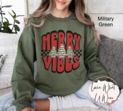 vintage christmas sweatshirt with checkered tree design and merry vibes for oversized holiday comfort and style 1hbcy