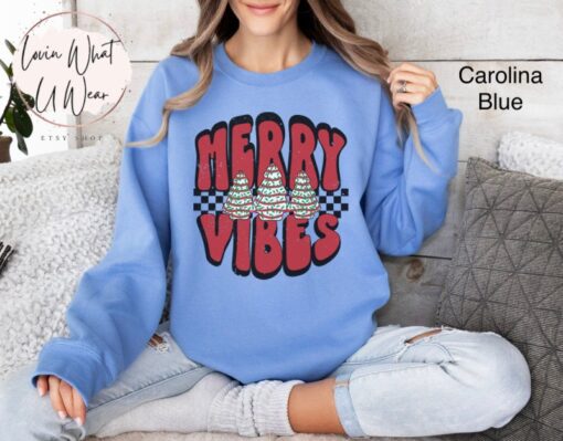 vintage christmas sweatshirt with checkered tree design and merry vibes for oversized holiday comfort and style ekkb6