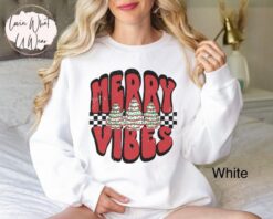vintage christmas sweatshirt with checkered tree design and merry vibes for oversized holiday comfort and style i4owv
