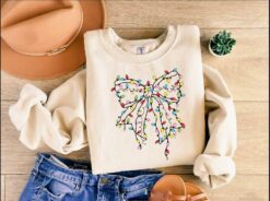vintage christmas sweatshirt with coquette bow design for retro style holiday celebrations and new year gatherings 7idxk