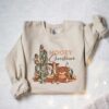 vintage christmas sweatshirt with cow print design for western style holiday celebrations comfortable adult crewneck sweater 9g1or scaled