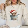 vintage christmas sweatshirt with highland cow design for western and southern style country holiday wear bbx5w