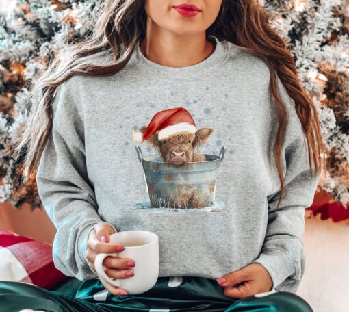 vintage christmas sweatshirt with highland cow design for western and southern style country holiday wear gvlwk