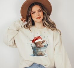 vintage christmas sweatshirt with highland cow design for western and southern style country holiday wear v1ymm
