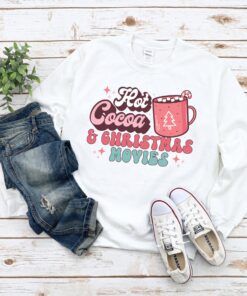 vintage christmas sweatshirt with hot cocoa and movies design for holiday traditions and retro style vdbox