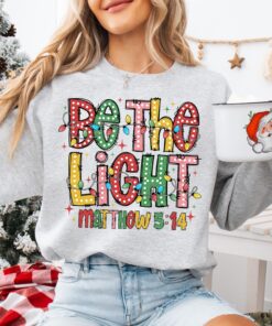 vintage christmas sweatshirt with inspirational bible verse and christmas lights design for a unique holiday look 48bfo scaled