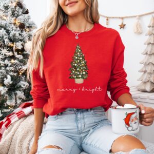 vintage christmas sweatshirt with merry and bright design featuring a christmas tree for holiday comfort in winter crewneck style 9rn82