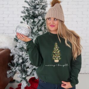 vintage christmas sweatshirt with merry and bright design featuring a christmas tree for holiday comfort in winter crewneck style fibvk