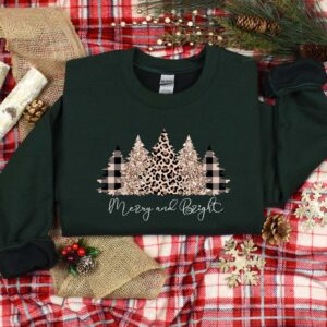 vintage christmas sweatshirt with merry and bright tree design for women featuring a festive forest theme and holiday spirit a3lca scaled