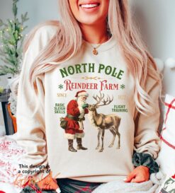 Vintage Christmas Sweatshirt with North Pole Reindeer Design Retro Style Long Sleeve Shirt for Holiday Celebrations