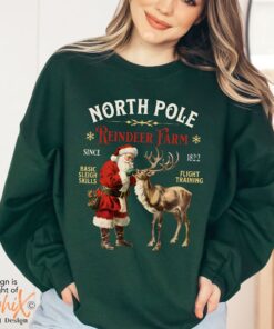 vintage christmas sweatshirt with north pole reindeer design retro style long sleeve shirt for holiday celebrations 45eph