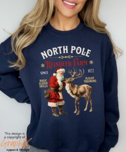 vintage christmas sweatshirt with north pole reindeer design retro style long sleeve shirt for holiday celebrations gcktq