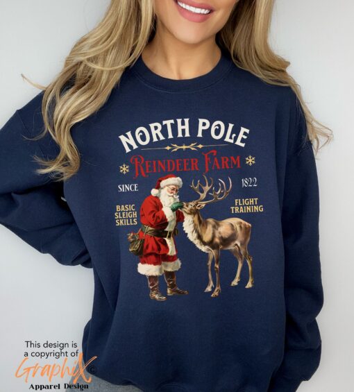 vintage christmas sweatshirt with north pole reindeer design retro style long sleeve shirt for holiday celebrations gcktq