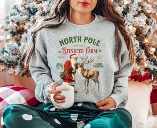 vintage christmas sweatshirt with north pole reindeer design retro style long sleeve shirt for holiday celebrations ul2hr